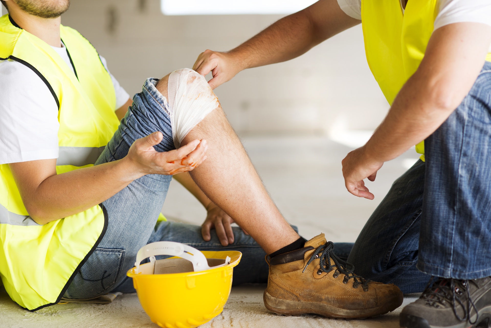 Image of a construction worker suffering personal injury at work